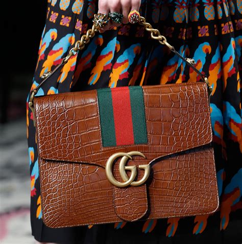 fancy brands like gucci|handbags like Gucci.